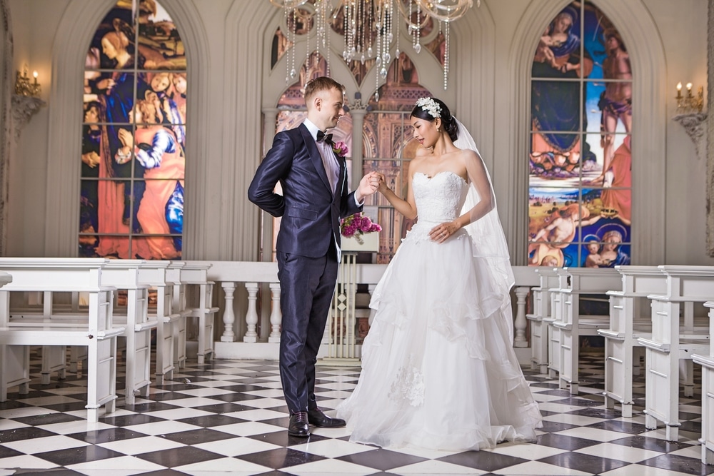 Front View Of Romantic Wedding Couple Looking At Each Other