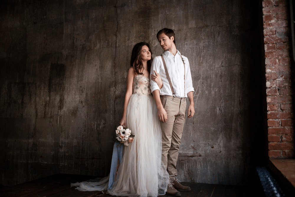 bride and groom in rustic dresses