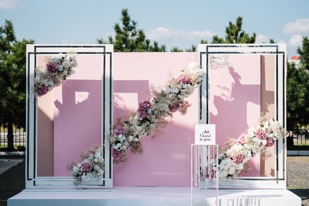 photobooth in backyard decorated with flowers