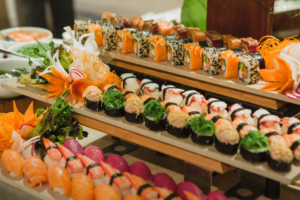 sushi and other sea food on a station