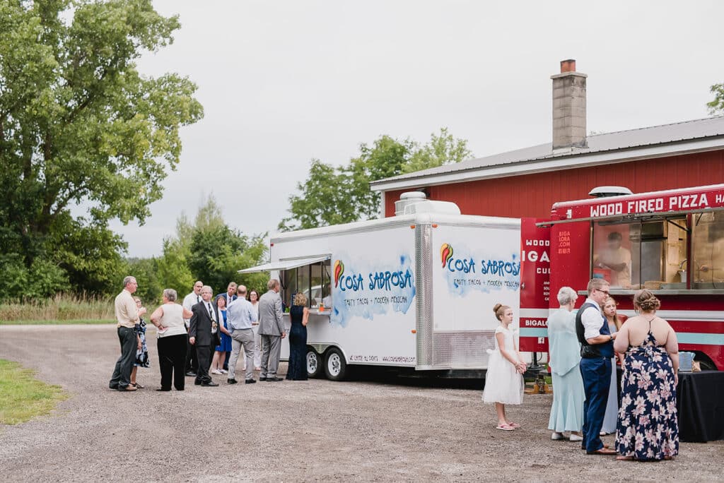 A view of guests standing in line at a Food Truck Wedding