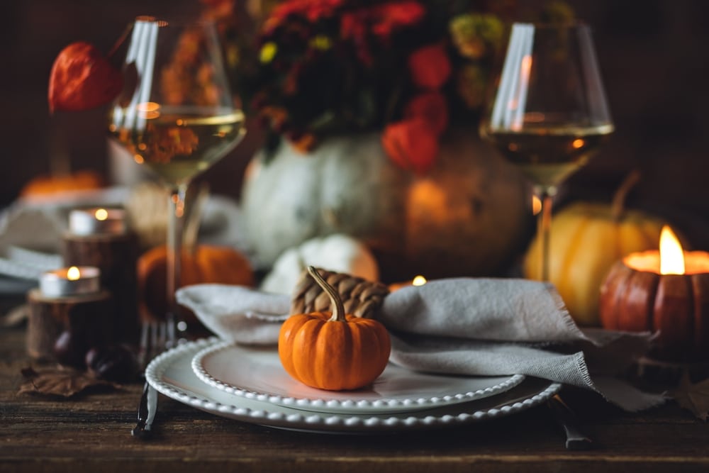 Elegant Seasonal Fall Table Setting With Floral Composition In A