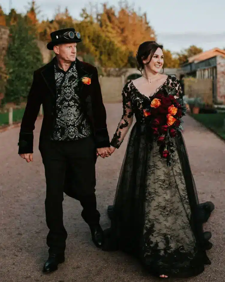 bride and groom wearing halloween inspired wedding attires