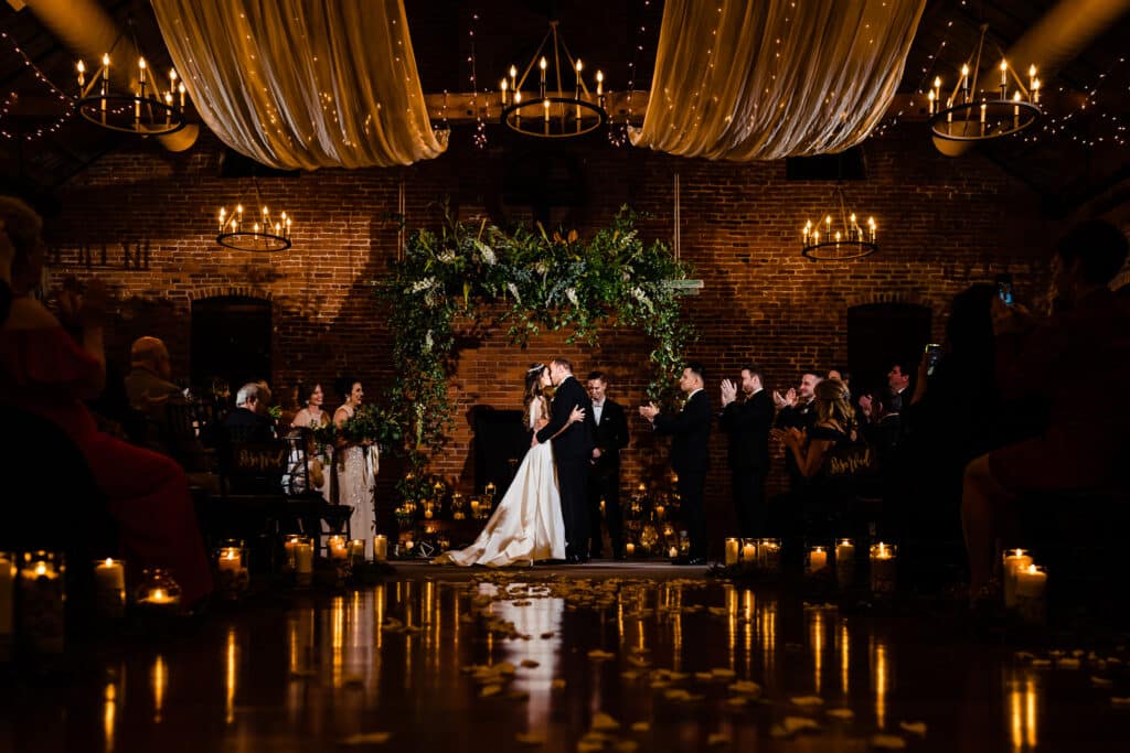 candlelit wedding ceremony in a hall 