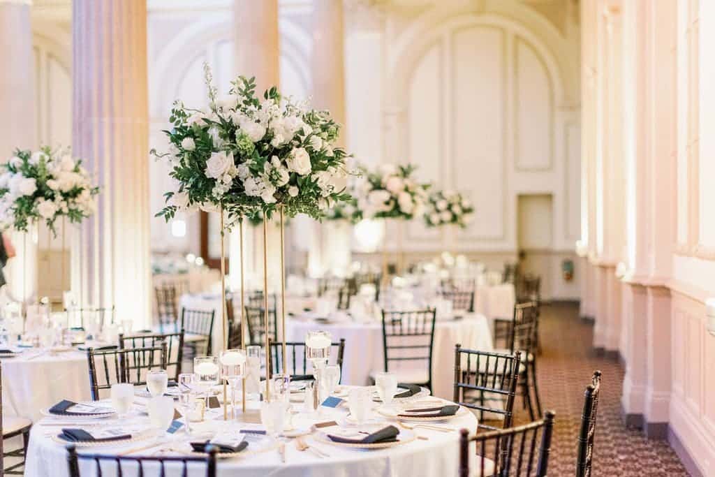 A view of a floral arrangement at a wedding table