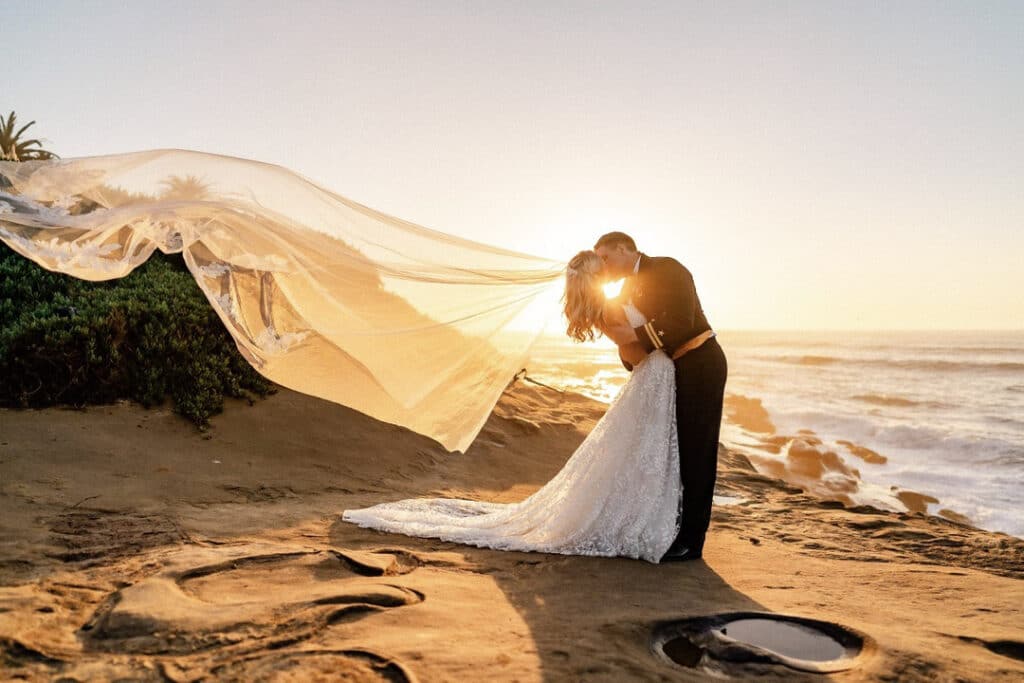 a couple pose for the pic during the sunset