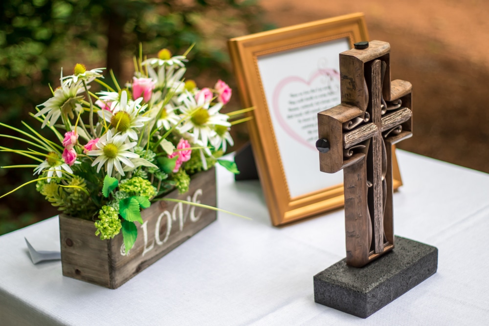 A view of a cross and wedding decor