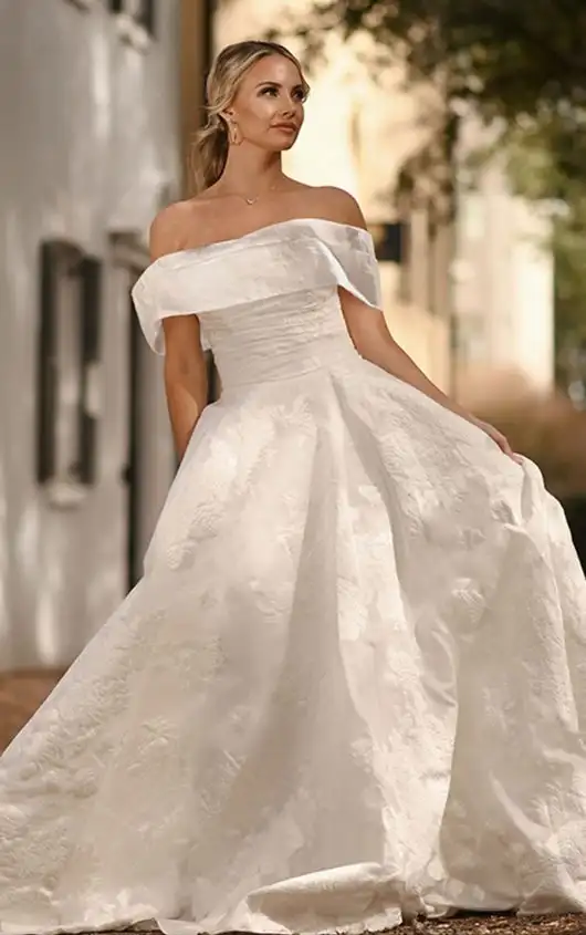 a bride wearing off shoulder wedding white color gown