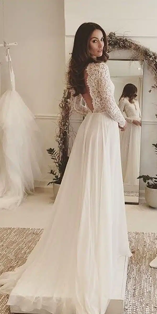 a bride wearing vintage theme gown with tale