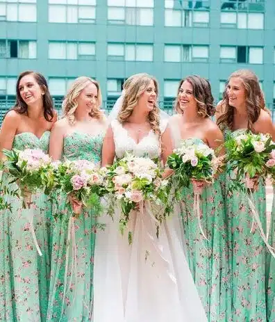 bride and bridemaids wearing mint green bridesmaid dresses