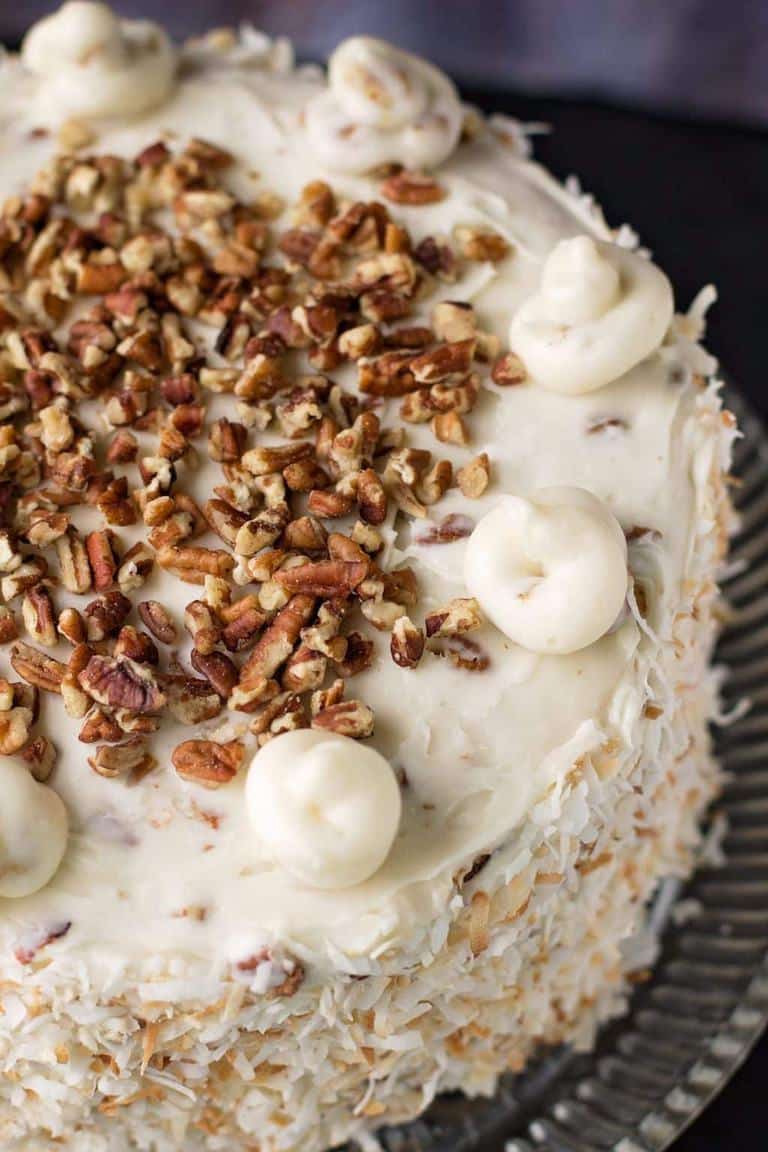 cloase view of italian wedding cake topped with pecans