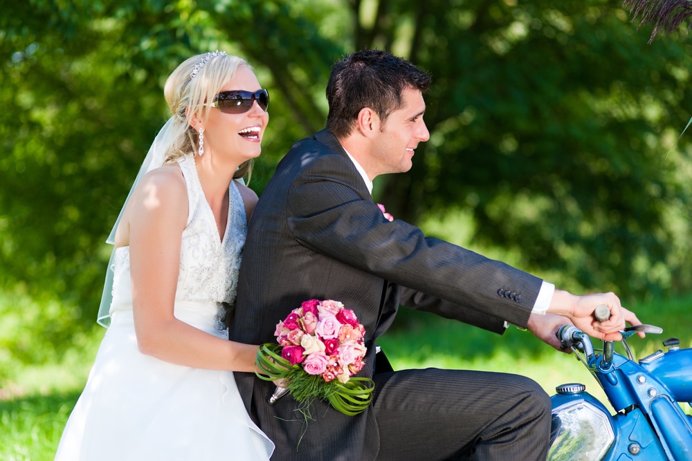 Wedding Couple On A Motor Bike Riding In The Future