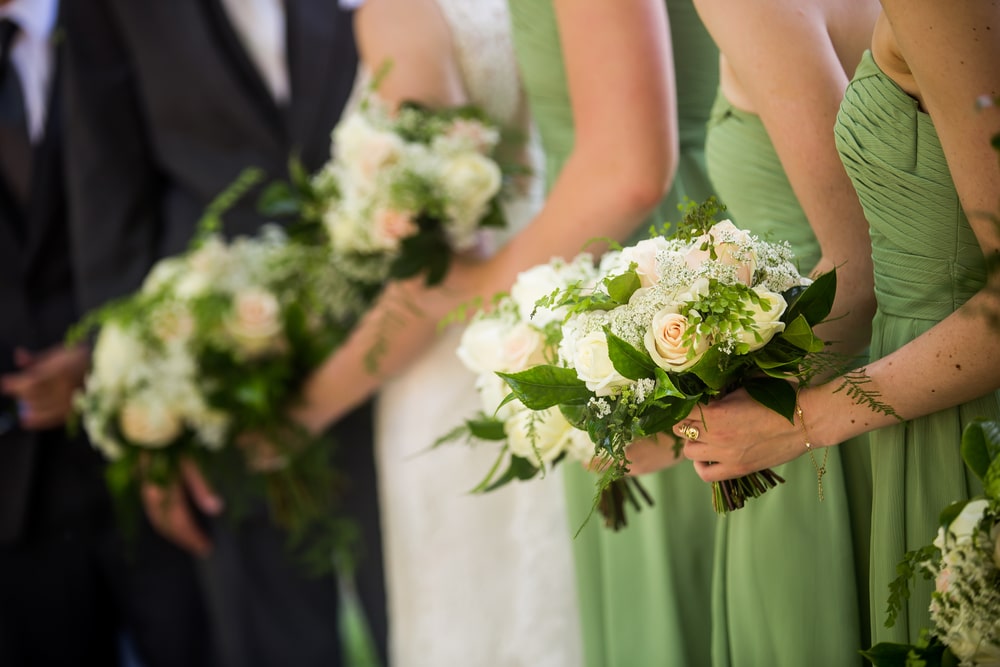 A Candid Photo Of Bride And Her Bridesmaids Wearing Light