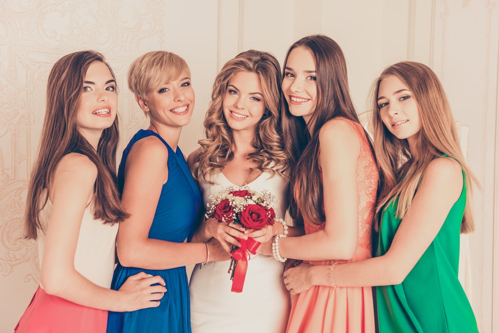 Beautiful And Happy Bride With Her Bridesmaids